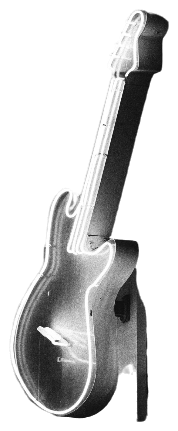 A neon guitar sign glowing against the night